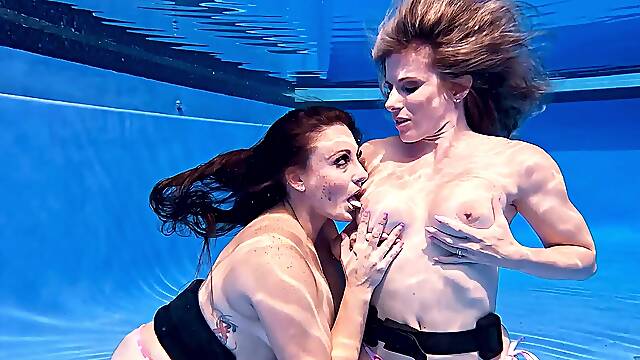 Long-haired brunette Cory Chase in hot pool scene