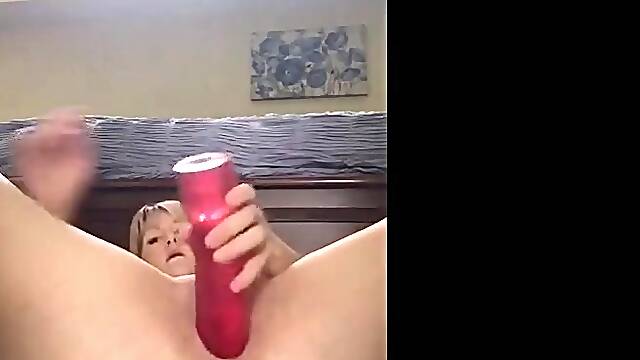 MILF Rides and Fingers Herself with a Big Sex Toy