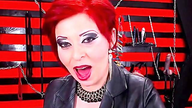 Seductive Redhead Milf Smoking in Latex Boots