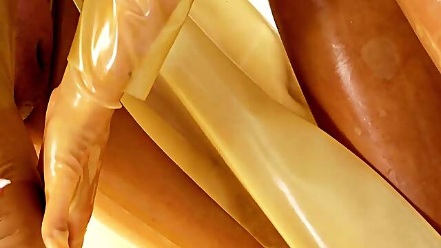 Sexy blonde milf in red latex fucks a toy and a dick