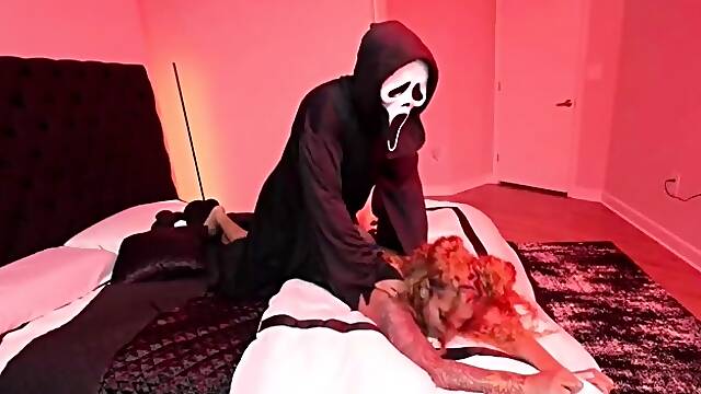 Ebony MILF gives a masked black stud free access to her cunt