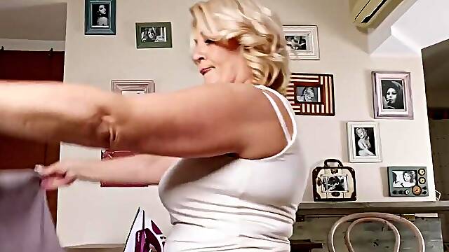 GILF bimbo Linetta is playing with her wet pussy