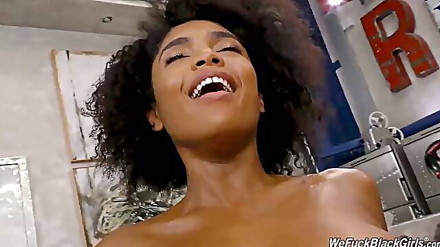 Small titted, black babe with curly hair, Luna Corazon got filled up with a big, white cock