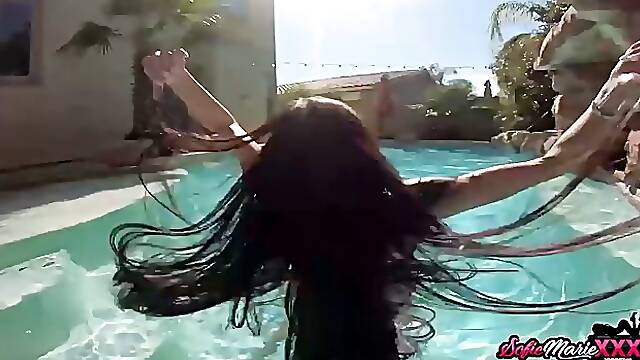 Fit busty brunette MILF masturbates underwater