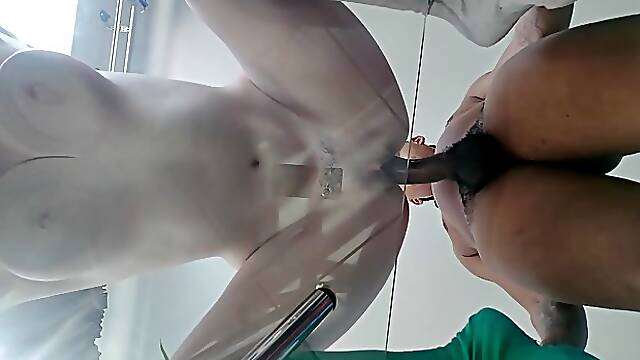 Amateur busty ebony girl gets fucked on glass table