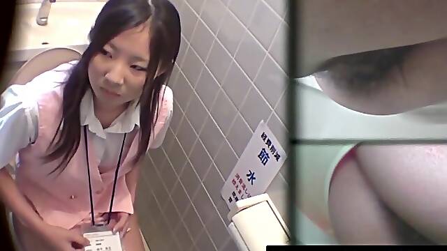 Lens grabs stunning Japanese workers peeing in toilet bowl