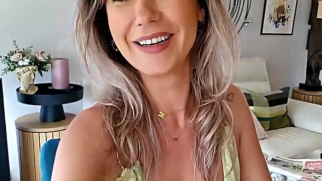 Busty Blonde MILF in Sexy Dress Shows Off Her Body and Rides