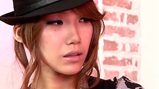 A solitary female engaging in self-enjoyment on a zebra-patterned daybed just for our observation