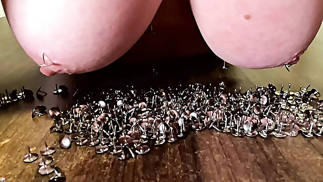 Putting breasts in thumbtacks