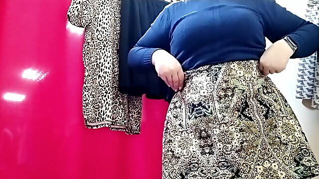 Mature milf tries on skirts in the mall on her big ass