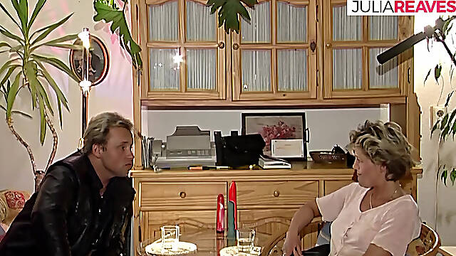 Blonde girl finger fucks with a dildo while lover watches