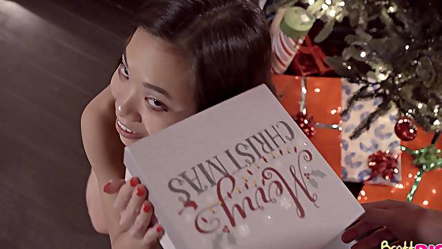 Seductive moments of Christmas sex for this petite Asian hon