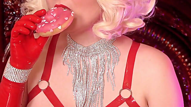 Sexy glamour pin up hot blonde eating in opera long latex rubber gloves