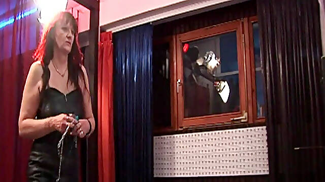 Mature Redhead Dominatrix Toys with Her Bound Slave
